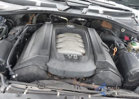 2004 Volkswagen Touareg V8 z USA, uszkodzony, nr VIN WVGEM77L04D054606